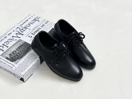 Boy's black leather shoes